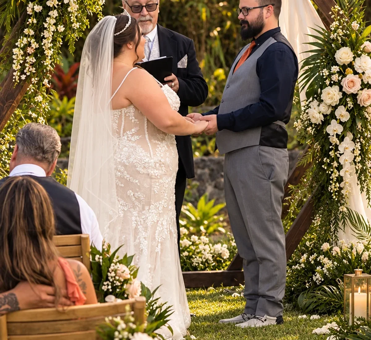 Couple exchanging vows during a Koa’s lawn ceremony